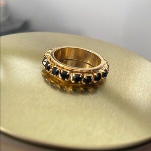 Elegant Gold and Black Stone eternity band ring